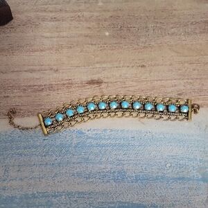Vintage gold tone chain bracelet with blue beading